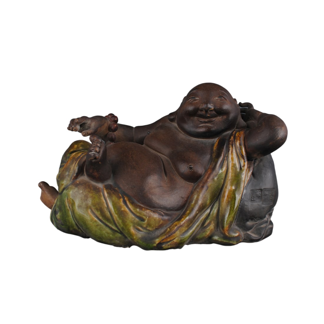 Statue of the famous artist from the late Qing Dynasty, Maitreya Buddha in Shibawan Kiln.: This statue of Maitreya Buddha from Shiwan Kiln, created by a renowned artist in the late Qing Dynasty, stands at 17 centimeters high and 26 centimeters wide. The sculpture features a plump and round