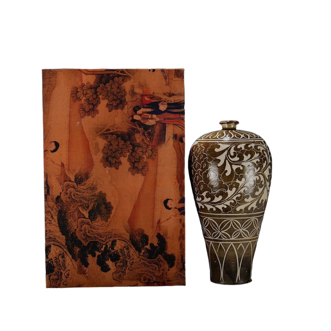Song Dynasty Ding kiln carved peony pattern plum bottle: This is a Song Dynasty carved plum blossom pattern plum vase from Ding kiln, measuring 30 cm in height and 16 cm in width. The vessel has an elegant shape, solid body, and smooth and graceful lines on