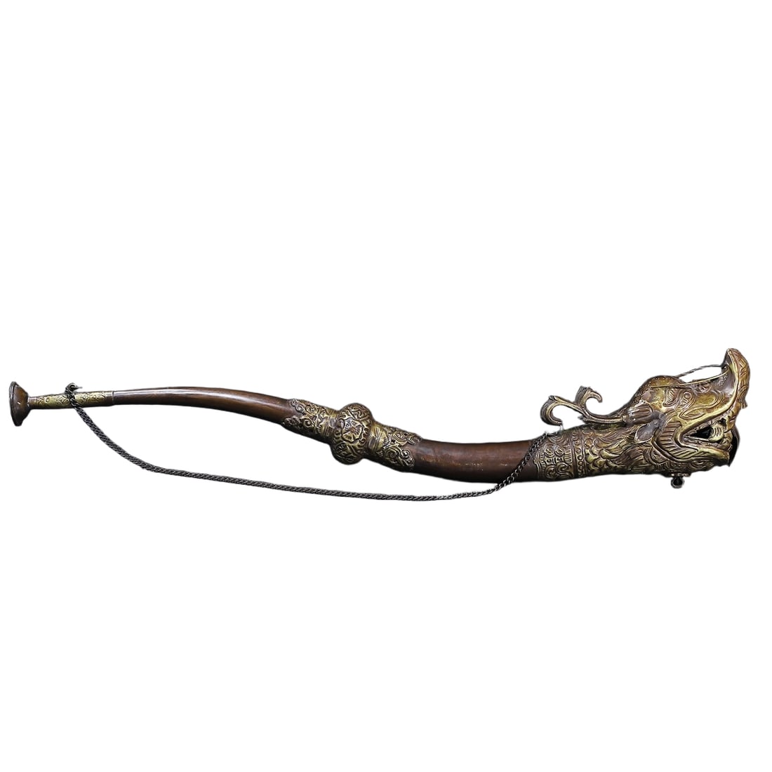 Copper dragon head, horn, lama's title.: Copper dragon head, also known as a horn, is a lama's title. It is 52 cm long, 9 cm wide, and weighs around 280 grams.