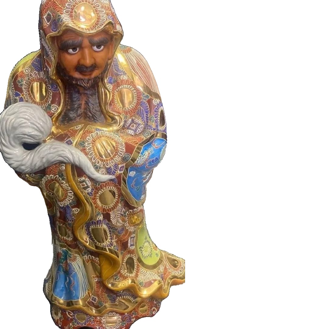 Traditional Kutani Ware Pottery: A ceramic statue adorned with golden decorations and exquisite patterns. Style: Ceramic decorative statue Colors: Gold, brown, blue, white Features: Exquisite patterns, holding a small white animal sc