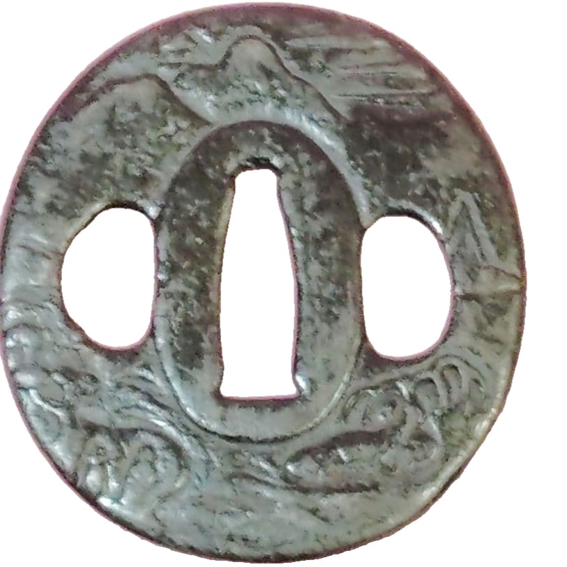 Sword guard (tsuba), inscribed with the characters (Wakasa), made of iron, decorated with: Signature: "Wakasa" Iron circular tsuba with landscape design, Edo period original Dimensions: 59.5 mm x 55 mm x 4 mm Handle diameter: 23.5 mm x 7 mm Weight: 60 g Excludes knife stand, caliper, and el