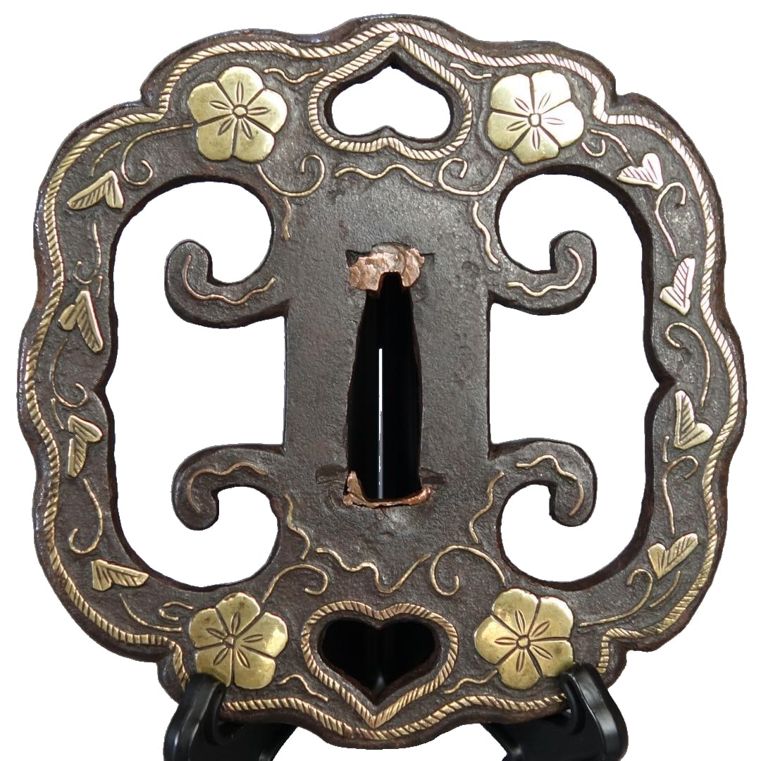 This is an inlaid-style tsuba (sword guard) from the Heian period, decorated with fern motifs and (1 of 20)