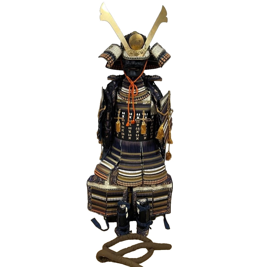 Unused, stored item. A life-size armor set produced by Marutake Armor Workshop, featuring a black: Life-sized armor, black breastplate, navy blue, white, and brown. Date of purchase unknown, but has never been used. No obvious stains or damage, though some areas of the fabric show slight fading or