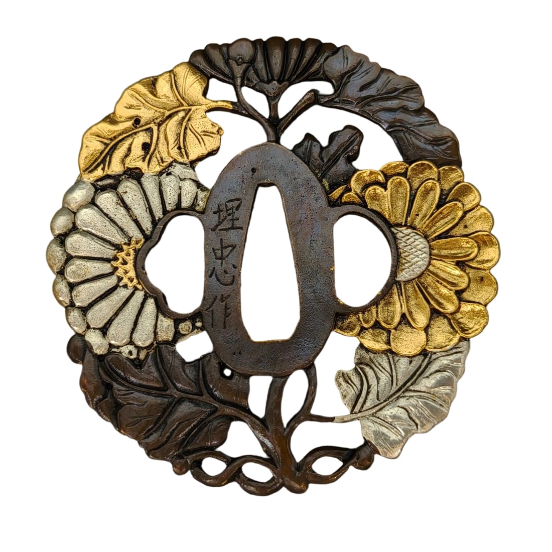 Japanese sword fittings, tsuba, with a large chrysanthemum design.: Japanese sword fittings, tsuba, featuring a large chrysanthemum design, copper base, metalwork, tsuba, used for iaido and kenjutsu. Material: Copper Dimensions: Approximately 75/78/5 mm Weight: Approx