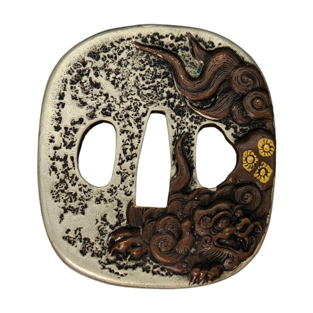 Japanese sword fittings, tsuba, with lion motif.: Japanese sword fittings, tsuba, featuring a lion motif, copper base, metalwork, tsuba, used for iaido and kenjutsu. Material: Copper Dimensions: Approximately 71/81/10 mm Weight: Approximately 263 gra