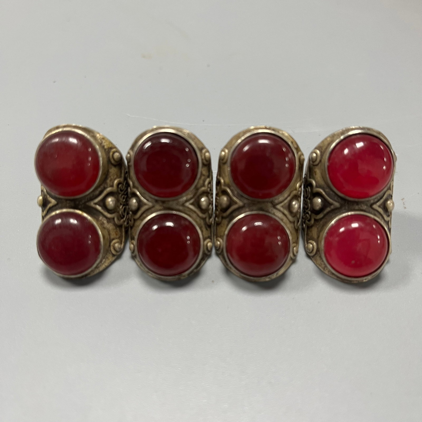 Four Qing Dynasty silver-set gemstone adjustable rings with foot markings (1 of 5)