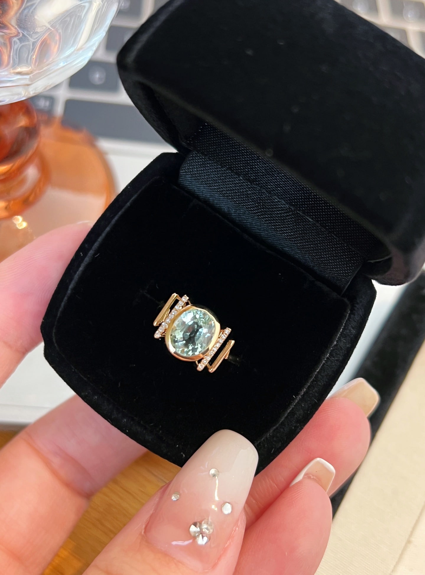 18K Gold Natural Mint Green Tourmaline Ring: This ring is meticulously crafted in 18K gold, featuring a refreshing mint green tourmaline that exudes unique charm. The band is designed in a musical note shape, adding a touch of artistic