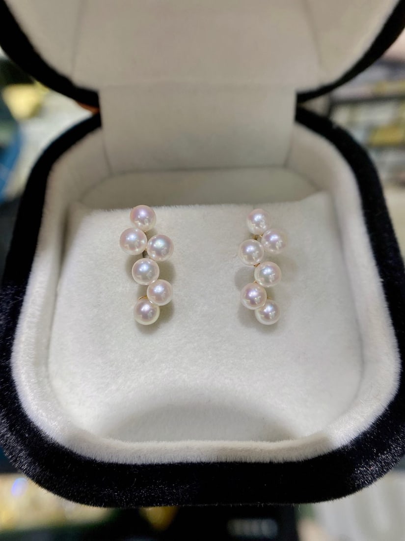 18K Gold Akoya Pearl Earrings: These earrings are crafted in 18K gold, featuring Akoya pearls that exude elegance. The pearls measure 3.5-4mm in diameter, showcasing a perfectly round and nearly flawless appearance.