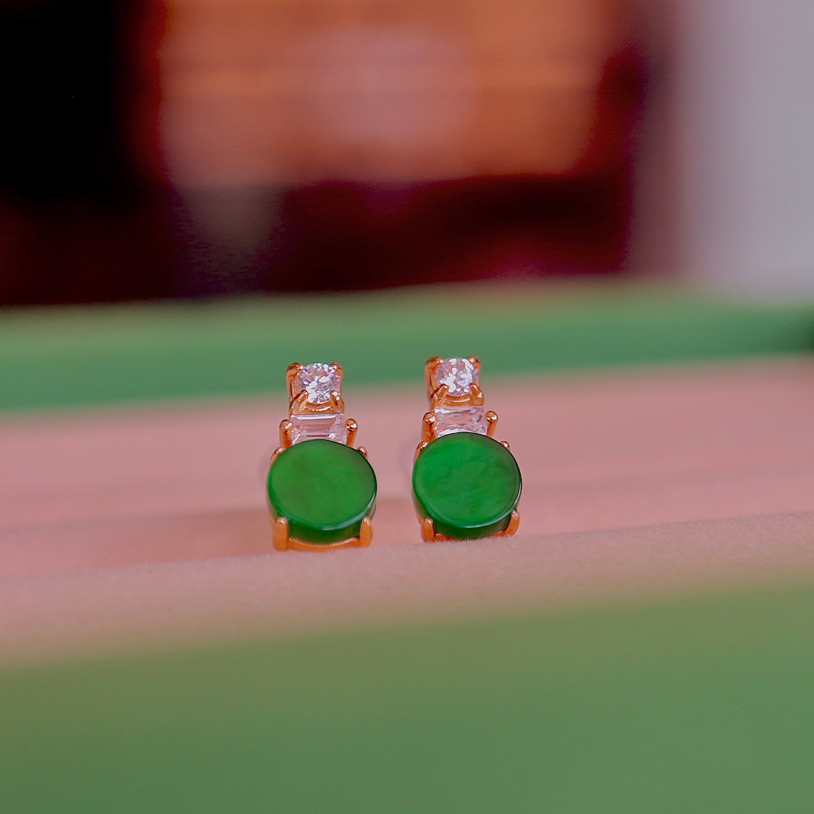 Natural Jade Earrings: These earrings feature natural jade as the main stone, showcasing a captivating full green color. Set in S925 sterling silver, the overall design is exquisite and elegant. The round cut of the jade