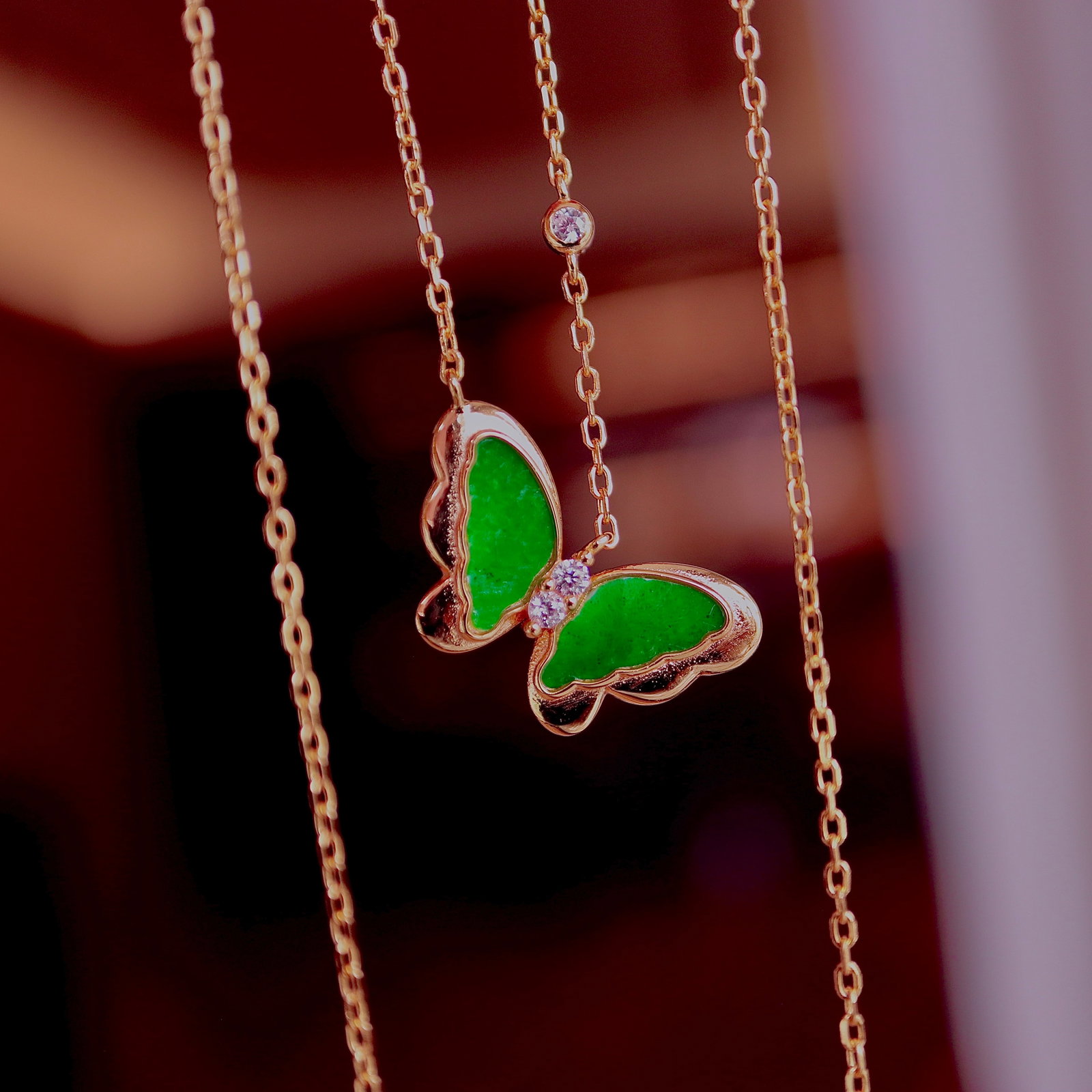 Natural Jadeite Butterfly Necklace: This necklace features a natural jadeite carved into an elegant butterfly shape, showcasing the vibrant green hue of the jadeite. Set in S925 sterling silver, it is simple and elegant, suitable for