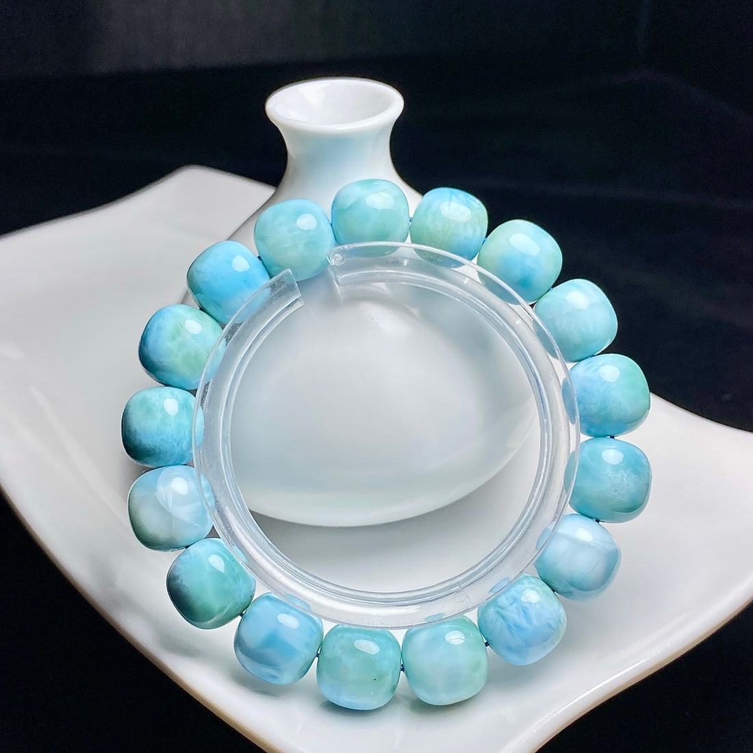 Natural Larimar Bracelet: This natural Larimar bracelet showcases ocean-like blue hues, with blue-green and white patterns resembling the waves of the sea. Its unique color and texture make it a valuable