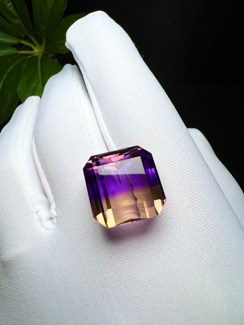 Natural Ametrine Gemstone: This natural ametrine gemstone showcases the purity of its crystal, with a mesmerizing blend of colors. Its substantial size and weight make it a prized choice for collectors. Ideal for setting in