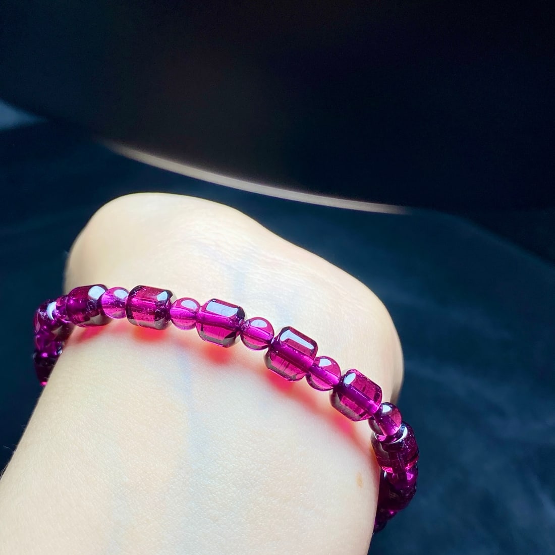 Natural Purple Garnet Bracelet: This bracelet is crafted from natural purple garnet, showcasing an enchanting purple hue. Each garnet is meticulously polished, forming an elegant bead chain. Wearing this bracelet adds a touch of nob