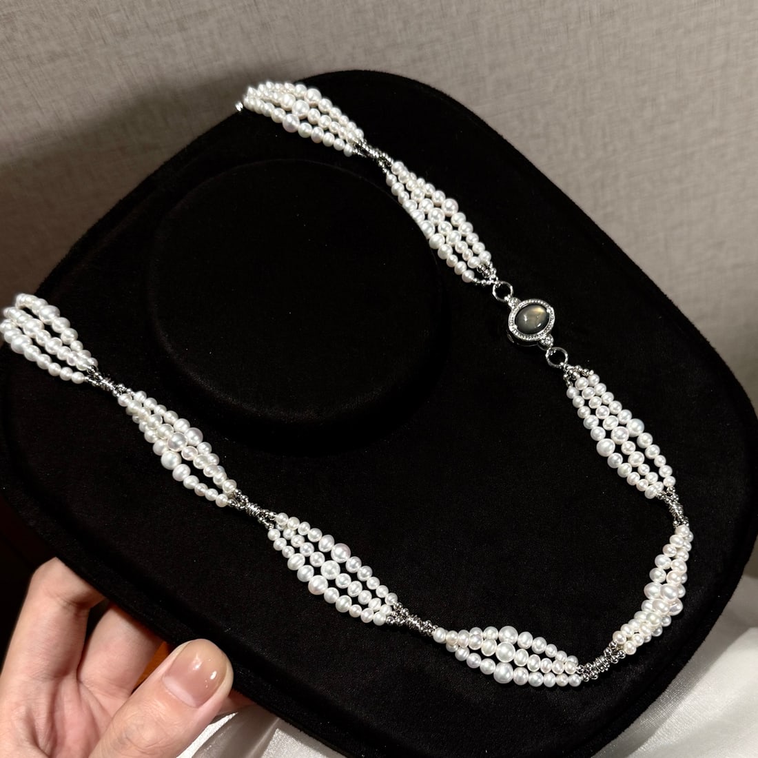 Natural High-Quality Freshwater Pearl Necklace: This necklace is crafted from 3-5mm near-round, high-luster, slightly blemished natural freshwater pearls, twisted into a romantic wheat spike shape. It features a new black shell magnetic clasp,