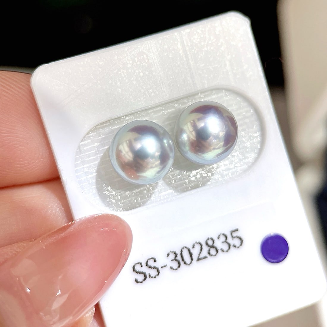 Japanese Akoya Madama Pearl Stud Earringsl: This pair of pearls showcases the natural beauty of untreated Akoya pearls, with a nacre thickness of 0.6mm and a diameter of approximately 8.3mm. Their nearly flawless round shape and original color