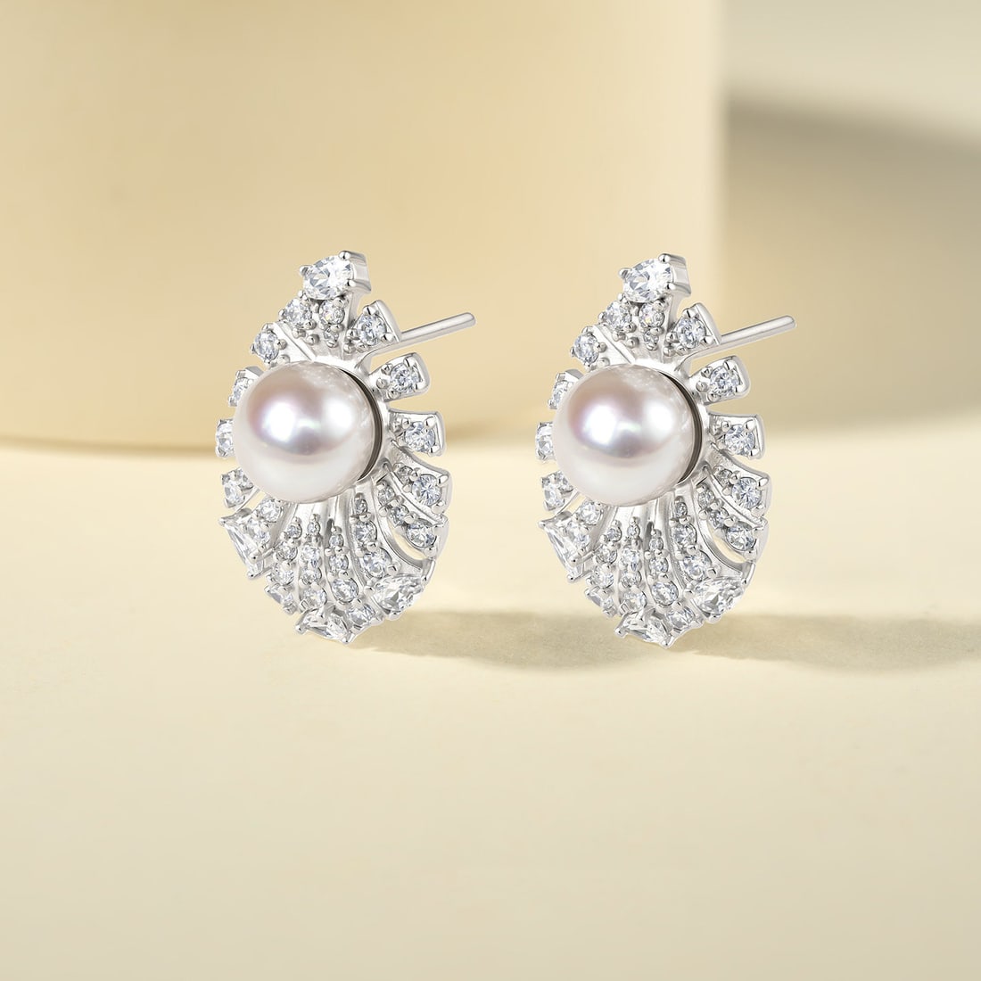 S925 Silver AKOYA Saltwater Pearl Earrings: These earrings elegantly showcase the natural luster of AKOYA saltwater pearls, paired with S925 silver for a touch of sophistication. The round shape of the pearls complements the shine of the silver