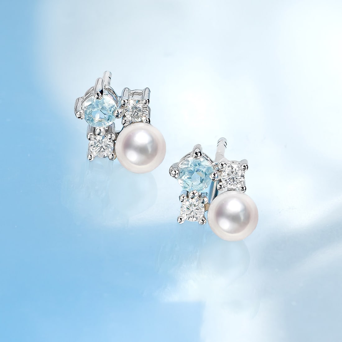 S925 Silver Seawater Pearl Earrings: These earrings feature a minimalist design that highlights the natural luster of seawater pearls, complemented by S925 silver for an elegant look. The round shape of the pearls harmonizes beautifully 