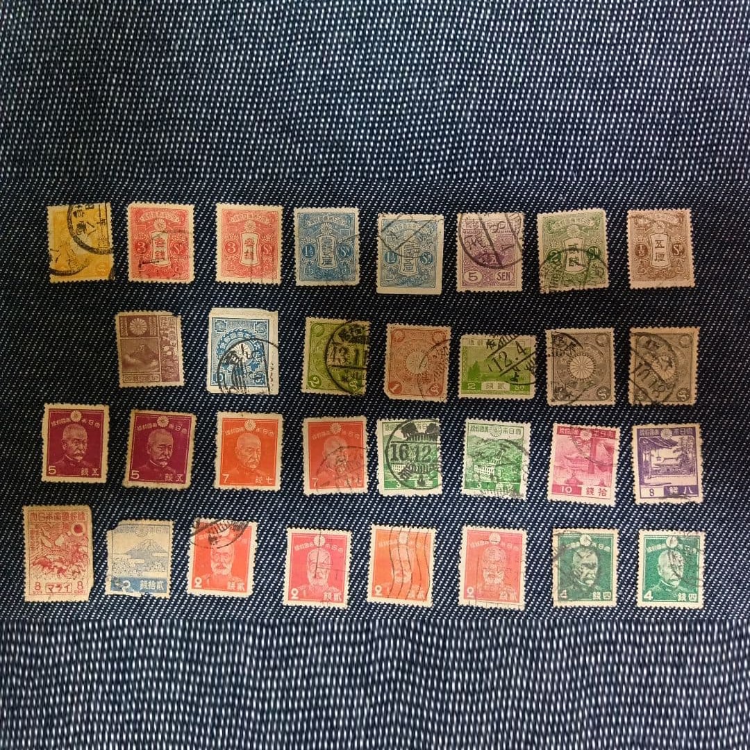 Japanese Postal Service Tenth Antarctic Expedition Commemorative Stamp and Other Vintage Stamps: A collection of old, used Japanese stamps. This item is of considerable age, has been used, and shows signs of damage due to long-term storage.