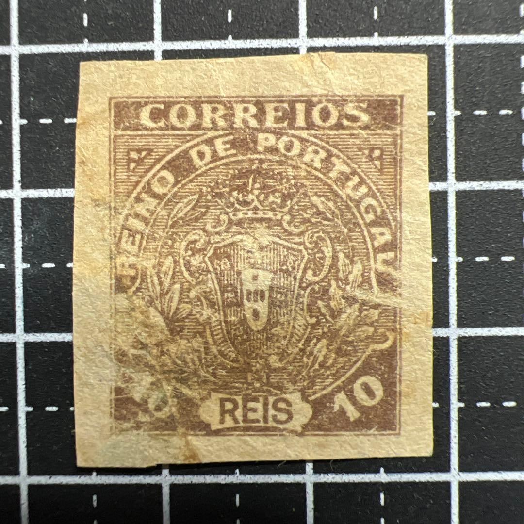 Unissued Stamp from the Northern Monarchy Period of Portugal, 1919.: This is an unissued stamp (10 Reis, brown, imperforate) from the "Monarchy of the North" established in Portugal in 1919. Stamp Details Country/Government: Kingdom of Portugal (Reino de Portugal) / Mo