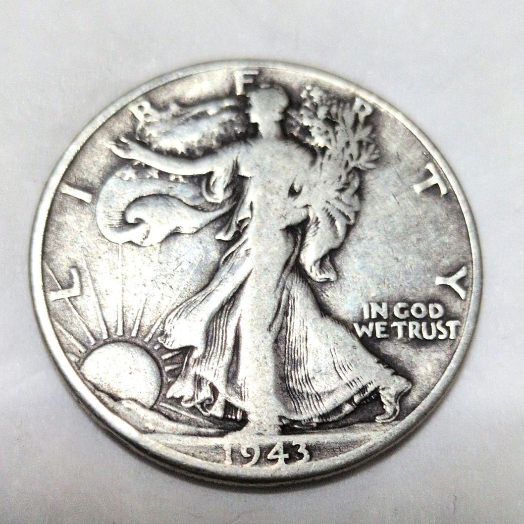 1943 United States Walking Liberty Half Dollar Silver Coin, Silver Content 90%: This is a 1943 United States Liberty Half Dollar Coin. It holds historical value. Weight: 12.54 grams Diameter: 30.4 mm Thickness: 1.9 mm The silver content of this coin is as high as 90%.