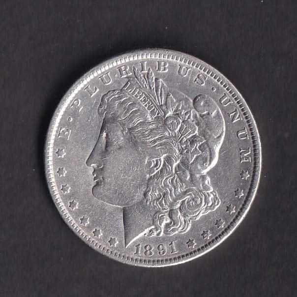 United States 1 Dollar Silver Coin, Morgan Silver Dollar, 1891: United States 1 Dollar Silver Coin, Morgan Silver Dollar, 1891 Material: 90% Silver Mint Mark: None Philadelphia Mint Actual Measurements: Diameter: 38.0 mm, Weight: 26.68 g, Thickness: 2.5 mm