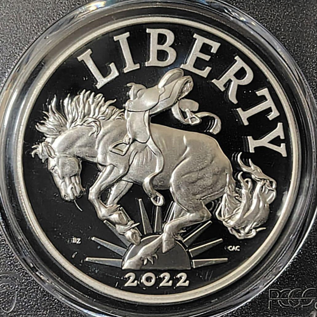 2022 American Silver Eagle Coin (PCGS Graded): This is the "2022 American Liberty Silver Medal" issued by the United States Mint. This medal is the fourth in the series, showcasing the spirit of American liberty with a modern design. The obverse f