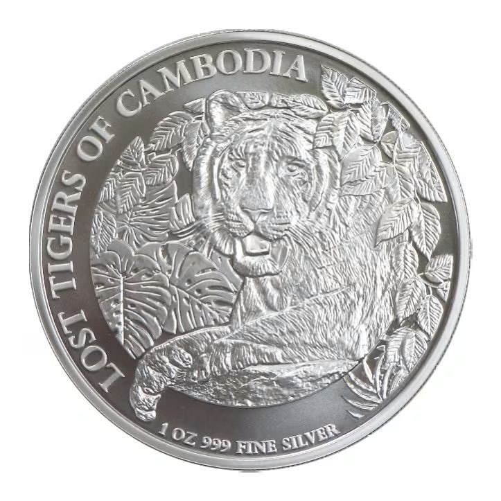 Accompanied by a Certificate of Authenticity and Protective Case / 2023 (Brand New) Cambodia "Lost: Product Name: 2023 (New Edition) Cambodia "Lost Tiger of Cambodia" 1 oz Silver Coin Purity: 99.9% Pure Silver Weight: 1 oz (31.1 grams) Condition: Brand New/Unused Mintage: 10,000 Dimensions: 40.7 mm 