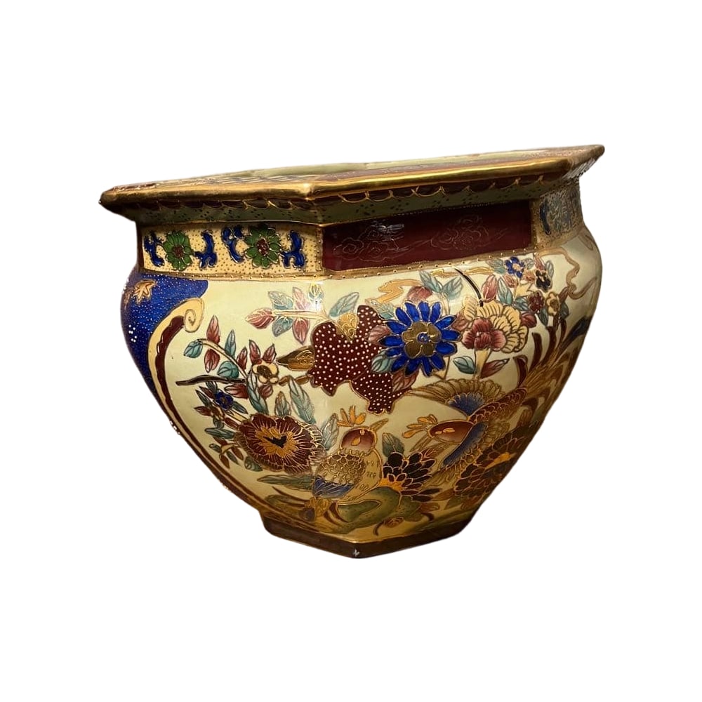 Large octagonal ceramic flower pot, decorated with floral and bird motifs, in the Kinrande style,: Given its lavish decoration and gilded embellishments, it is highly likely to be Satsuma ware or a similar style of Kinrande ceramics. Its shape suggests it is either a brazier with an octagonal