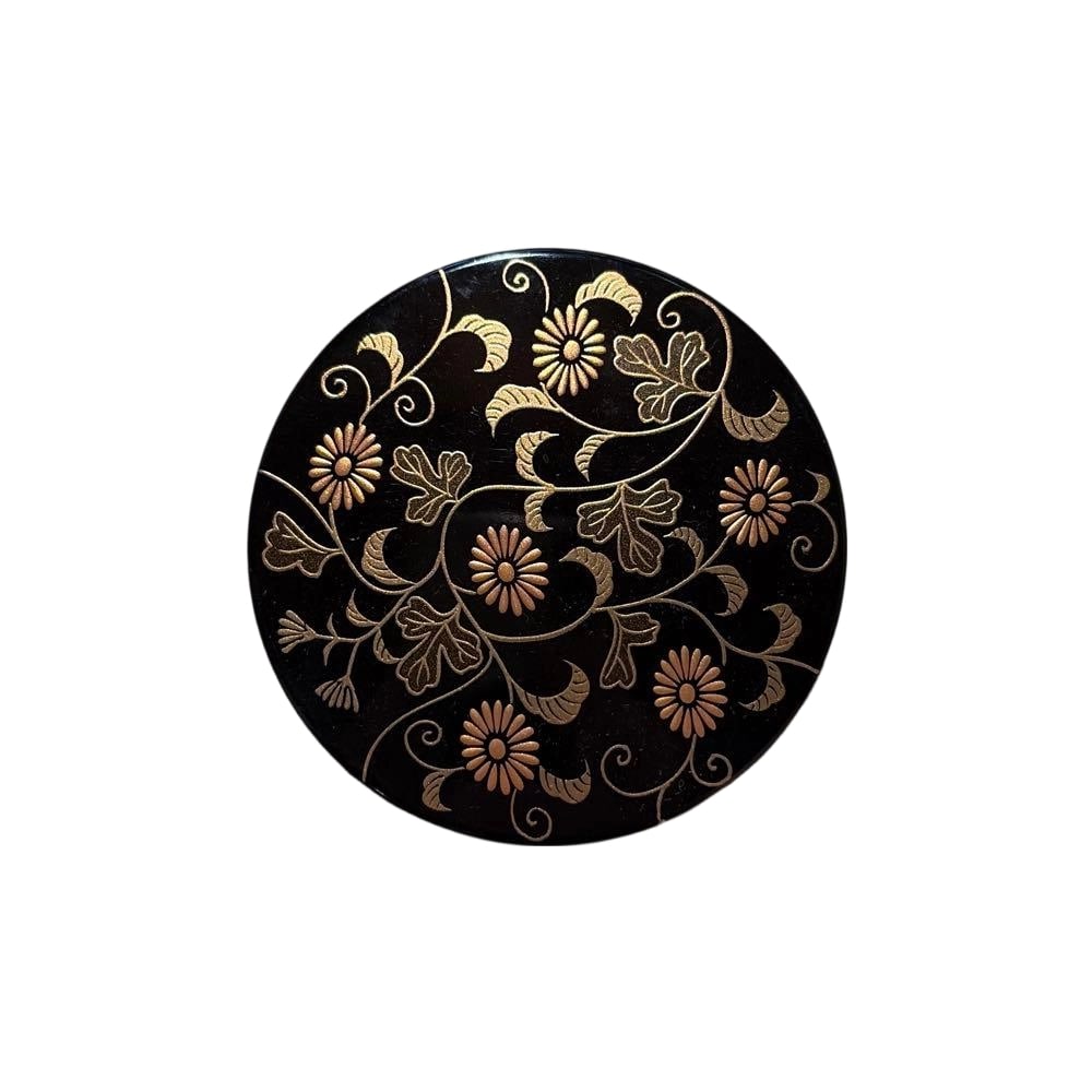 This incense box features a black base adorned with gold floral patterns. (1 of 3)