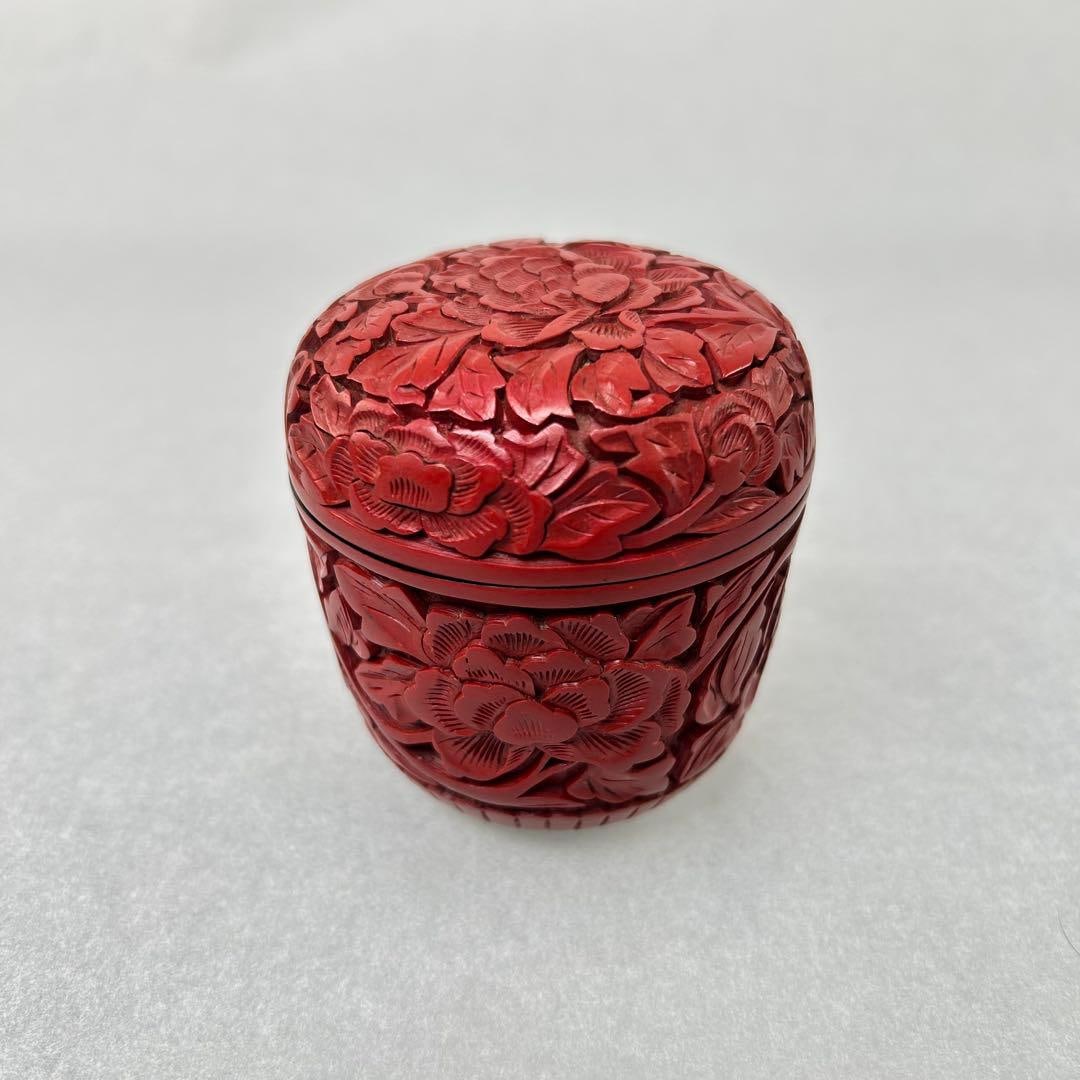 This is an ancient Chinese carved lacquer tea caddy.: This is an ancient Chinese carved lacquer tea caddy. While there are no obvious scratches or damages, as an antique from China, it may have some minor stains or imperfections.