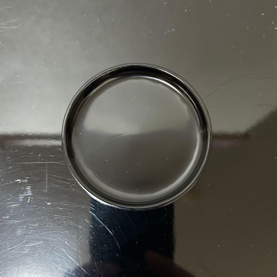 This is a flat, circular incense box. - 8
