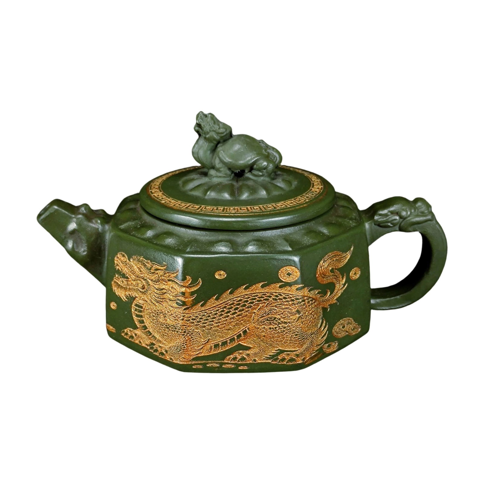 Gu Jingzhou Original Ore Green Clay Dragon Pattern Zisha Teapot: A Zisha teapot by master Gu Jingzhou, crafted from original ore green clay, adorned with exquisite dragon patterns, showcasing the exquisite craftsmanship of traditional techniques. This teapot is not