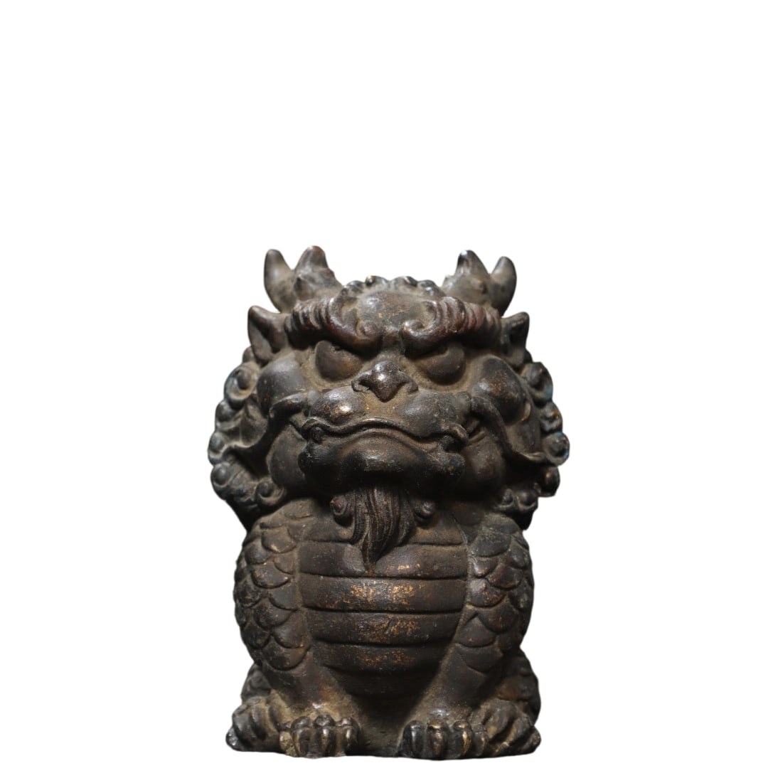 Bronze Gilded Mythical Beast Qilin Ornament: This bronze gilded mythical beast Qilin ornament features a vivid design and exquisite craftsmanship, showcasing the superb skills of ancient artisans. As a symbol of good fortune, the Qilin is highly