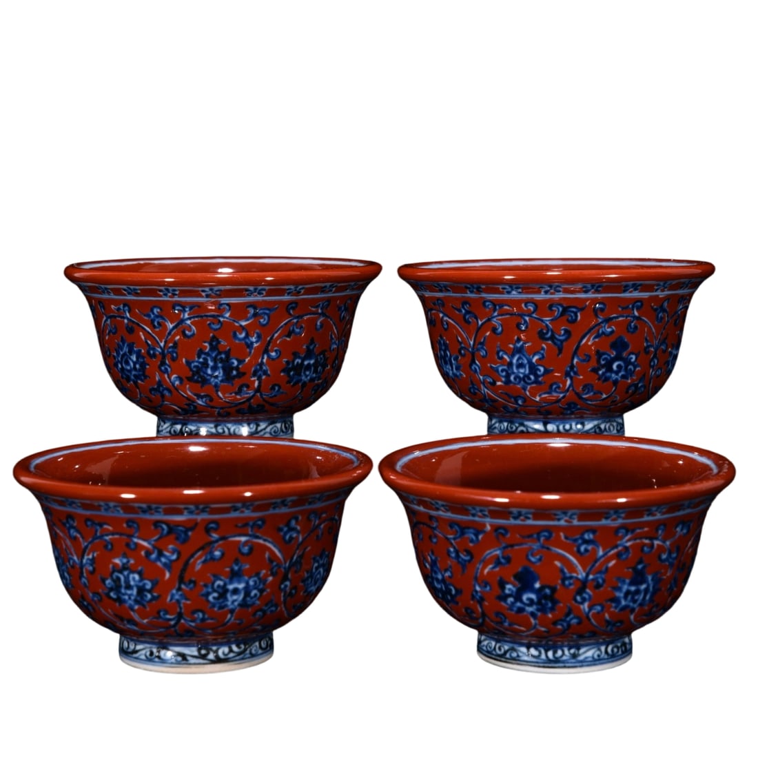 Ming Yongle Red Ground Underglaze Blue and Red Floral Pattern Cup: This red ground underglaze blue and red floral pattern cup from the Ming Yongle period exemplifies the elegance and exquisite craftsmanship of Yongle porcelain. The contrasting colors of the red