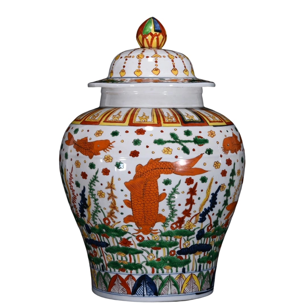 Ming Jiajing Underglaze Red Fish and Algae Pattern Covered Jar: This Ming Jiajing period underglaze red fish and algae pattern covered jar showcases the unique charm of Ming dynasty ceramics with its vivid colors and exquisite craftsmanship. The jar is adorned wit