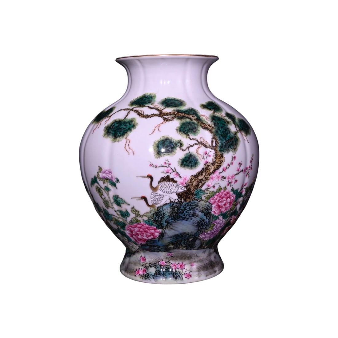Yongzheng Period Famille Rose Melon-Shaped Vase with Pine and Crane Design: This Yongzheng period famille rose melon-shaped vase with pine and crane design showcases the exquisite craftsmanship and elegant motifs of the era's porcelain. The pine and crane pattern symbolizes