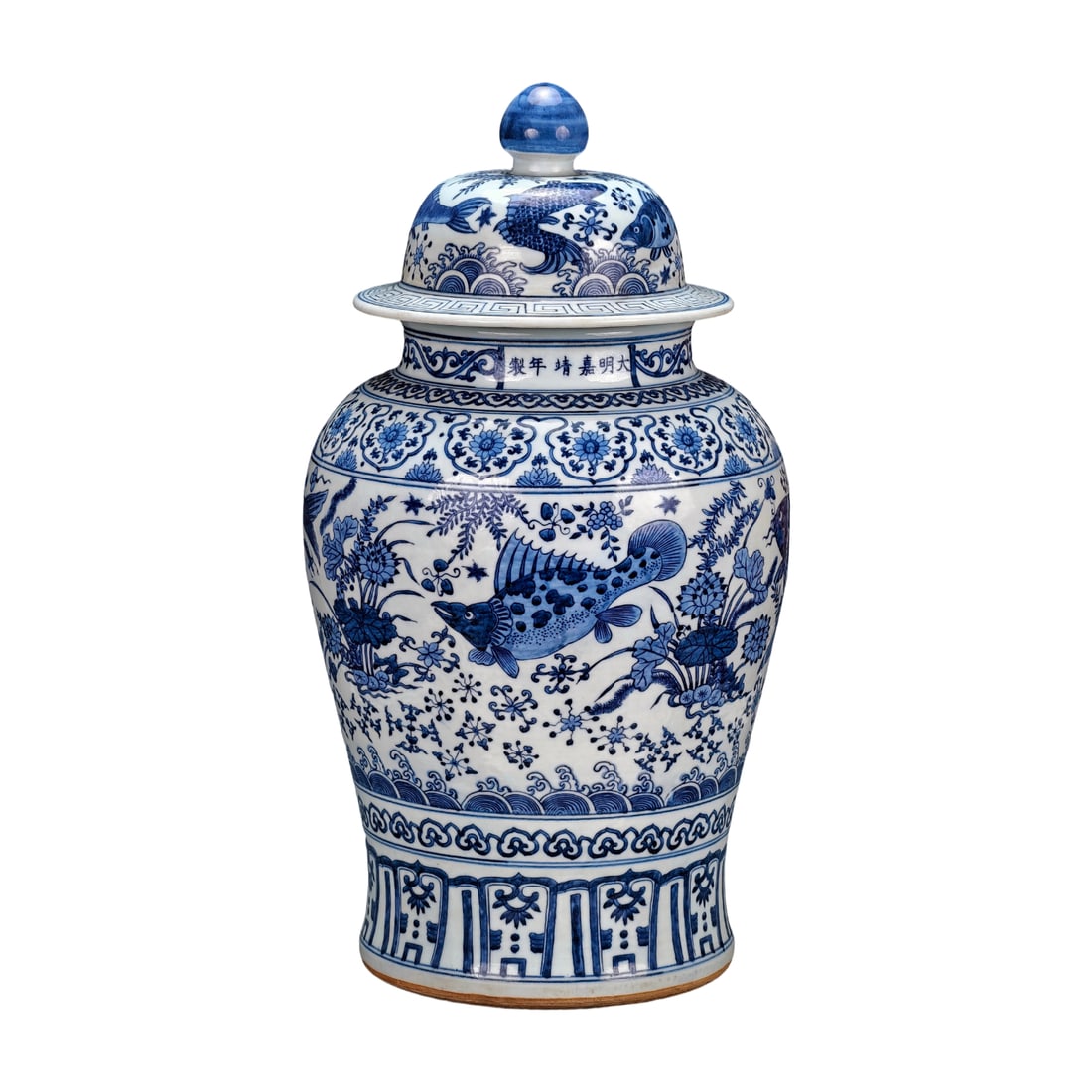 Ming Dynasty Blue and White General Jar with Lotus Pond and Fish Design: A blue-and-white porcelain jar with a lotus pond and fish motif, made during the Jiajing reign of the Ming Dynasty. Height: 69cm, Width: 36cm. The jar depicted is exquisitely crafted and beautifully p