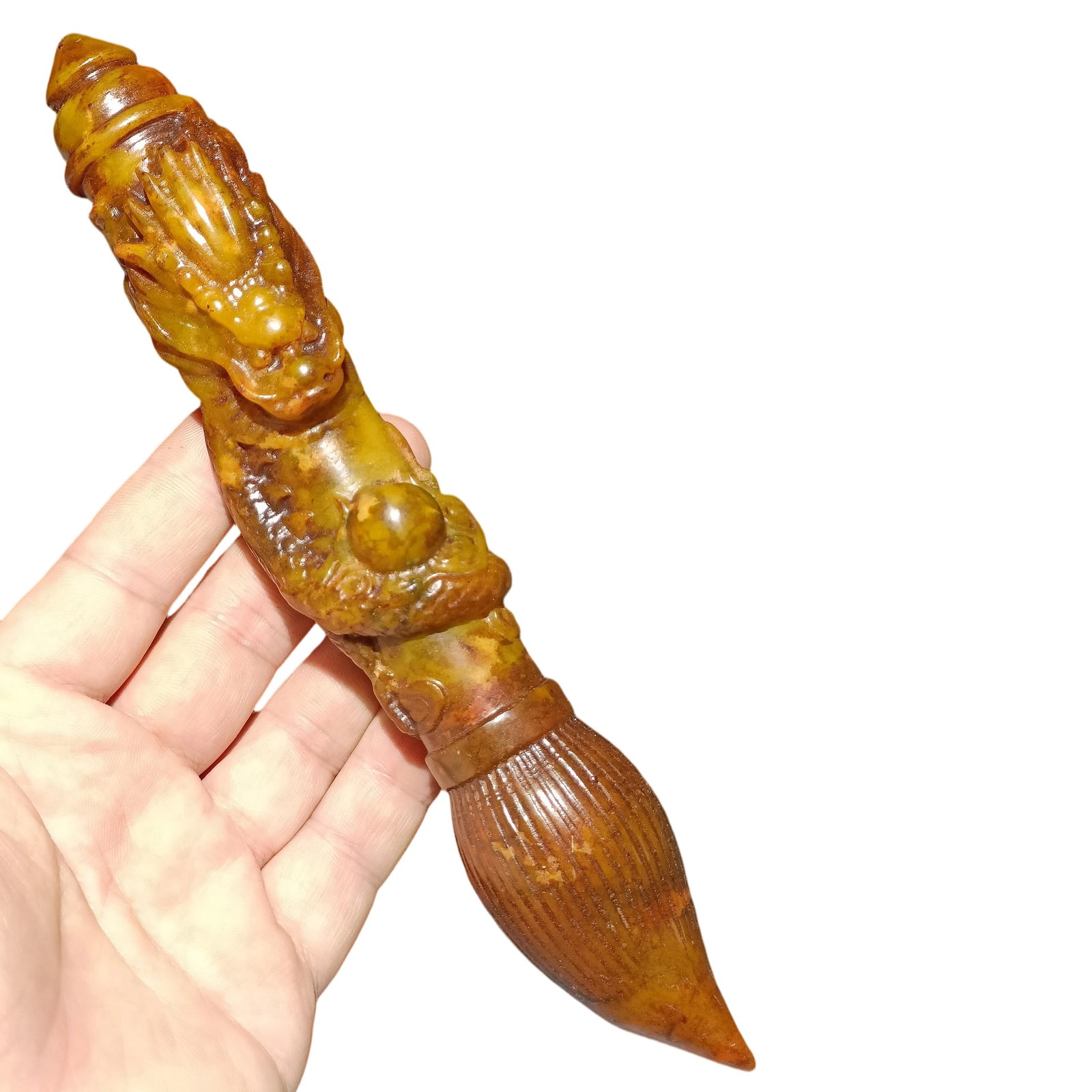 Ancient Jade Dragon Brush: This ancient jade dragon brush is exquisitely crafted, with smooth lines and a warm jade texture. Its perfect condition and intricate carving demonstrate the superb skills of ancient craftsmen. As a