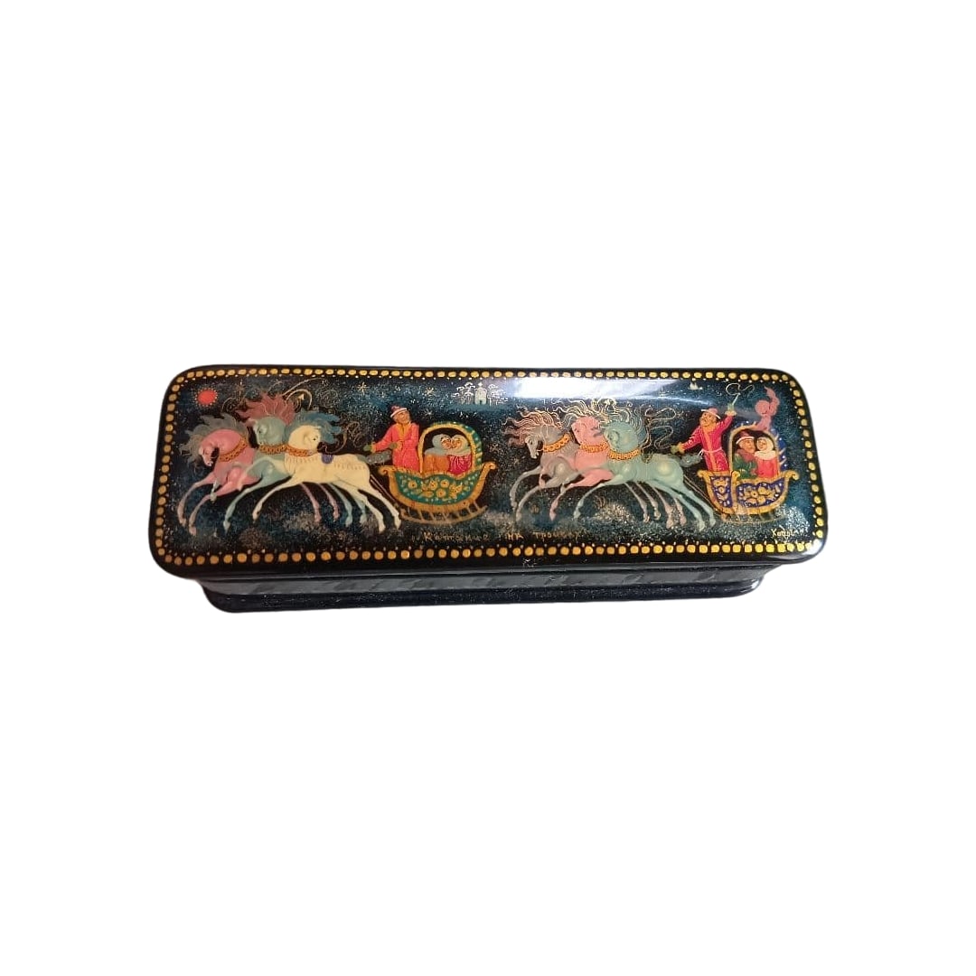 Lacquerware Inro with Horse and Human Design: Design: Decorative design depicting horses and humans Interior: Red interior Material: Lacquerware Decoration: Adorned with gold decoration Exterior: Black exterior