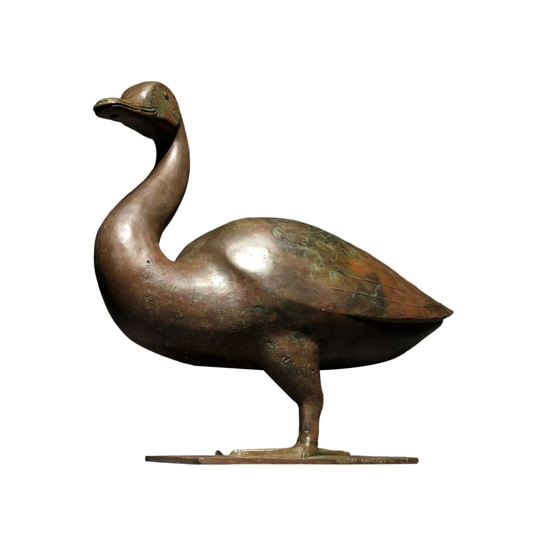 Qin Dynasty Bronze Duck: This Qin Dynasty bronze duck showcases the exceptional casting techniques of ancient times with its unique shape and exquisite craftsmanship. The bronze surface, weathered over time, displays a