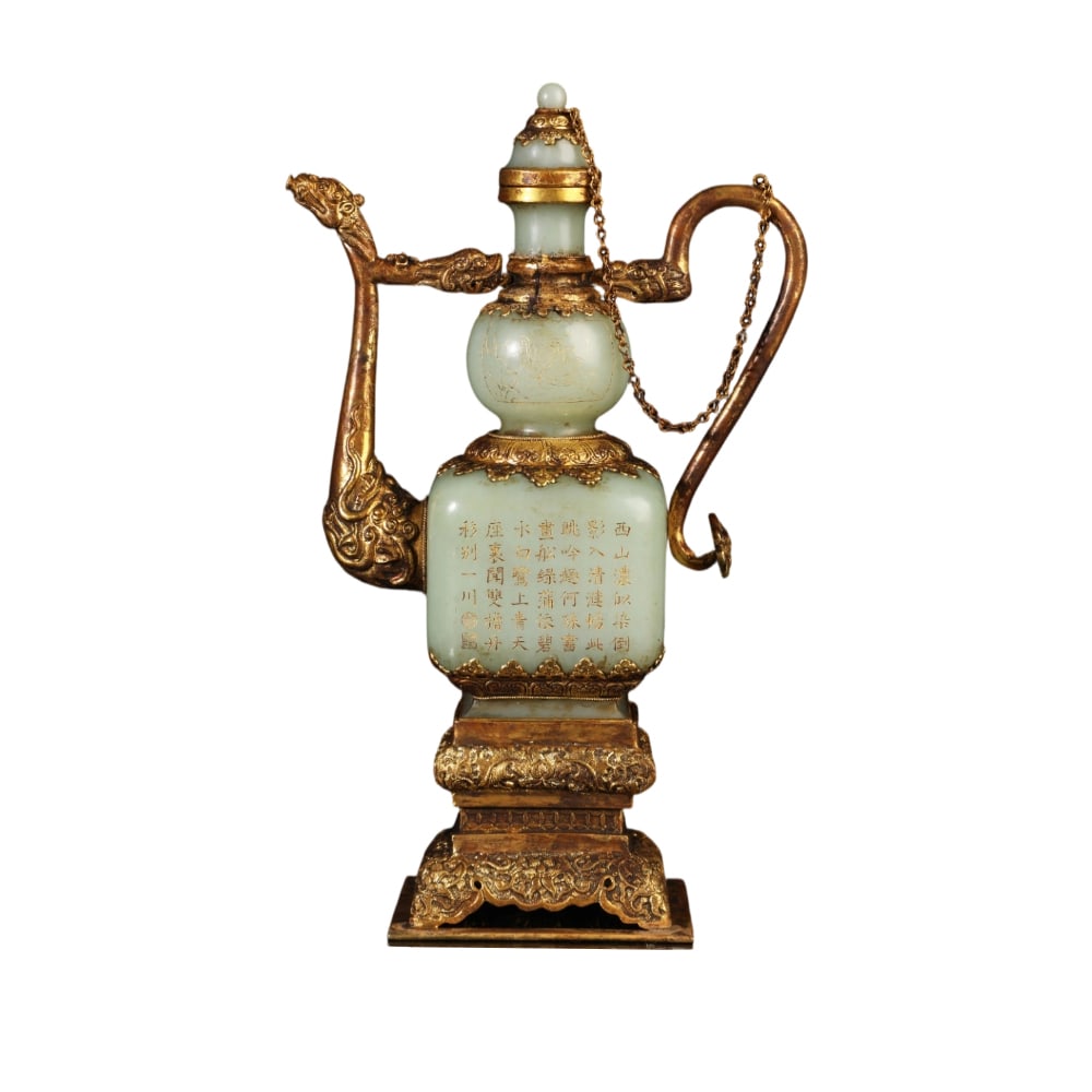 Qing Dynasty Hetian White Jade Gilt Poem Gourd-shaped Ewer: This Qing Dynasty imperial Hetian white jade ewer, inlaid with gold and inscribed with poems, is carved from Hetian white jade. The jade is warm and delicate in texture, with a pale bluish-white hue