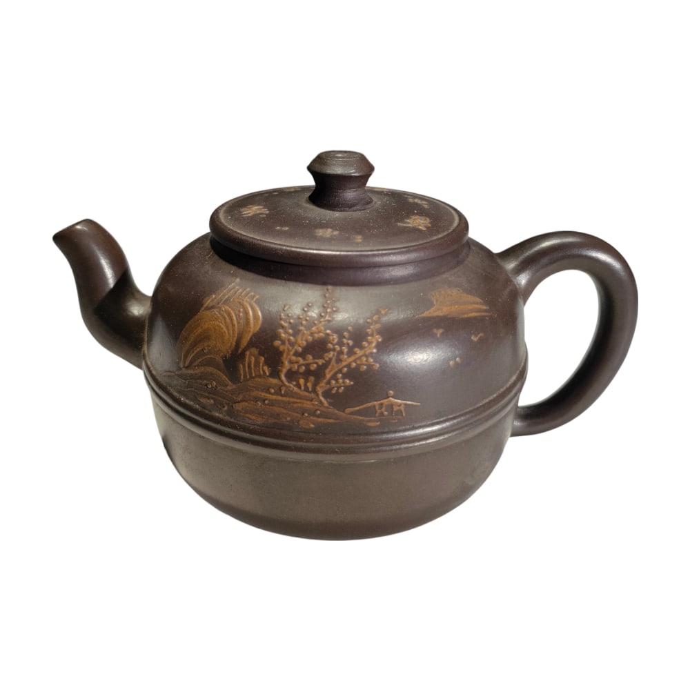 Large Yixing Zisha Teapot with Relief and Multiple Holes: This Yixing Zisha teapot, crafted by Master Gu Jingzhou, features exquisite relief work and a unique multi-hole design, showcasing exceptional artistic charm. The teapot is in excellent condition,