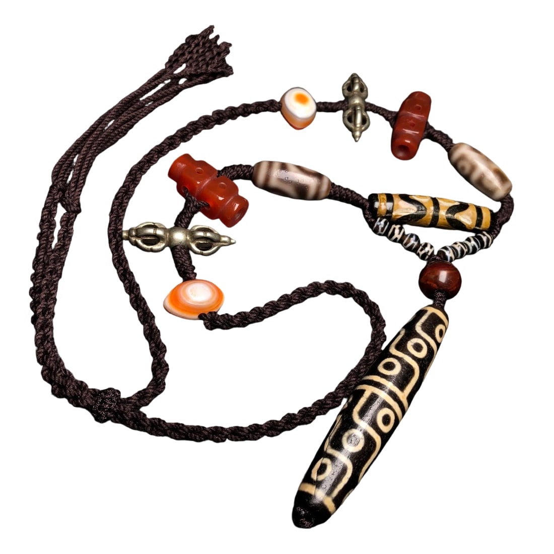 Tibetan 18-eyed dzi bead necklace: This necklace is meticulously crafted with eighteen-eyed dzi beads, tiger tooth dzi beads, two-eyed dzi beads, six-eyed dzi beads, and old agate beads. The horse hoof pattern is clear, and the patina 