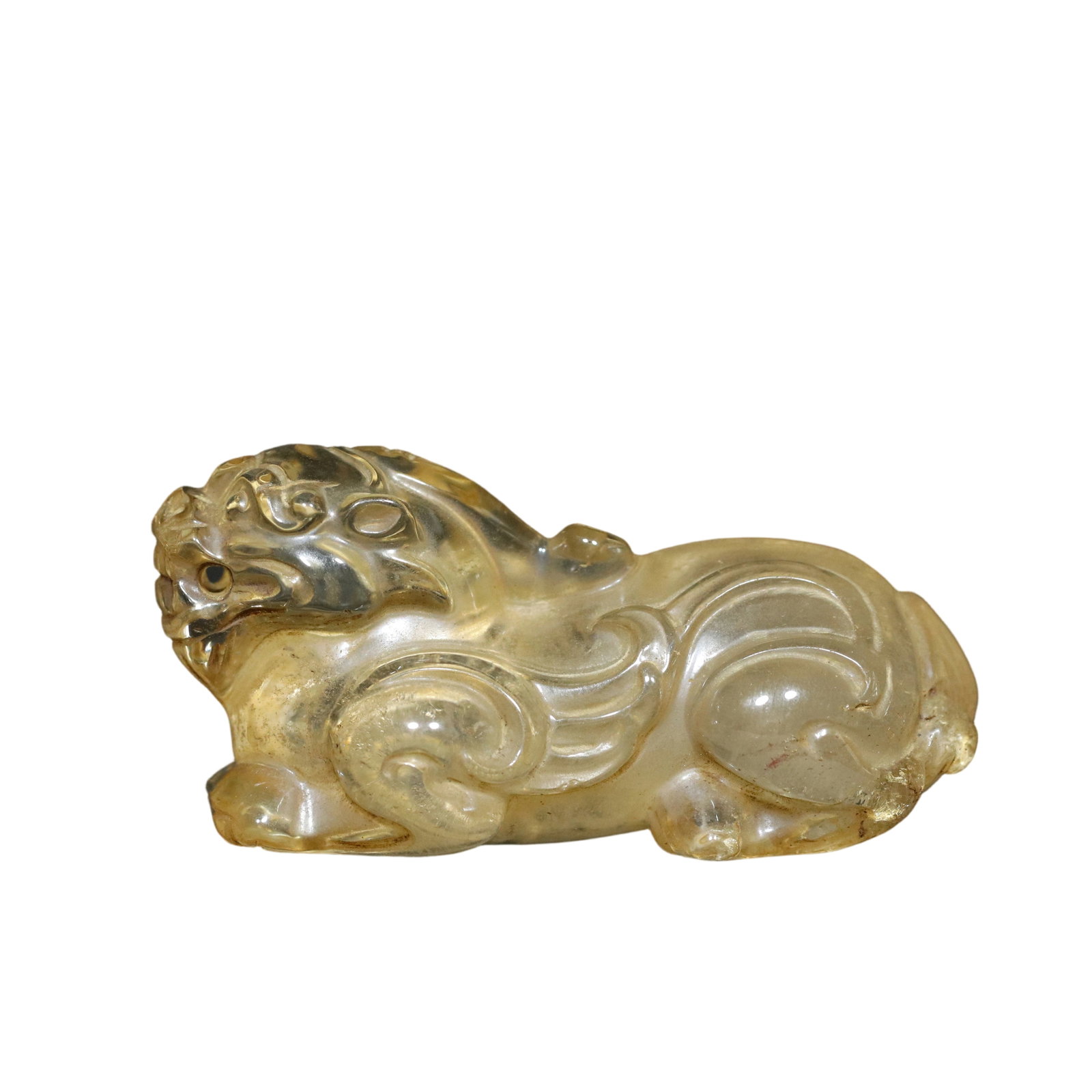 Natural Old Crystal Carved Auspicious Beast Ornament: This natural old crystal carved auspicious beast ornament features exquisite craftsmanship, with transparent crystal and a patina that speaks of its age, showcasing an elegant and ancient artistic
