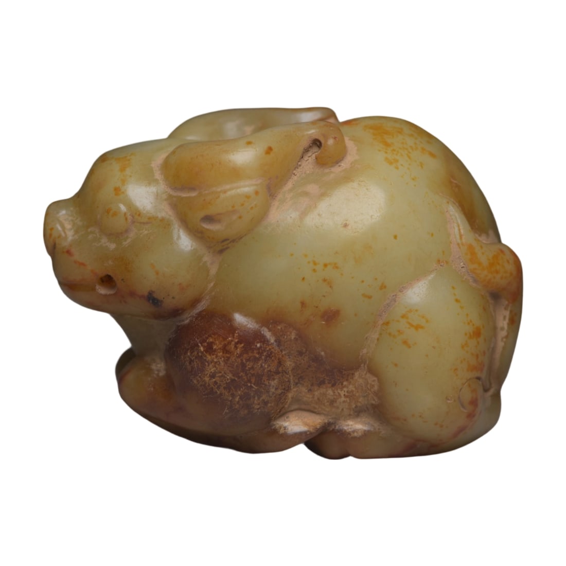 Hetian Ancient Jade Beast: This Hetian ancient jade beast features a vivid shape and a smooth, warm texture. The natural patina and fine carving demonstrate the exquisite craftsmanship of ancient jade carving techniques.