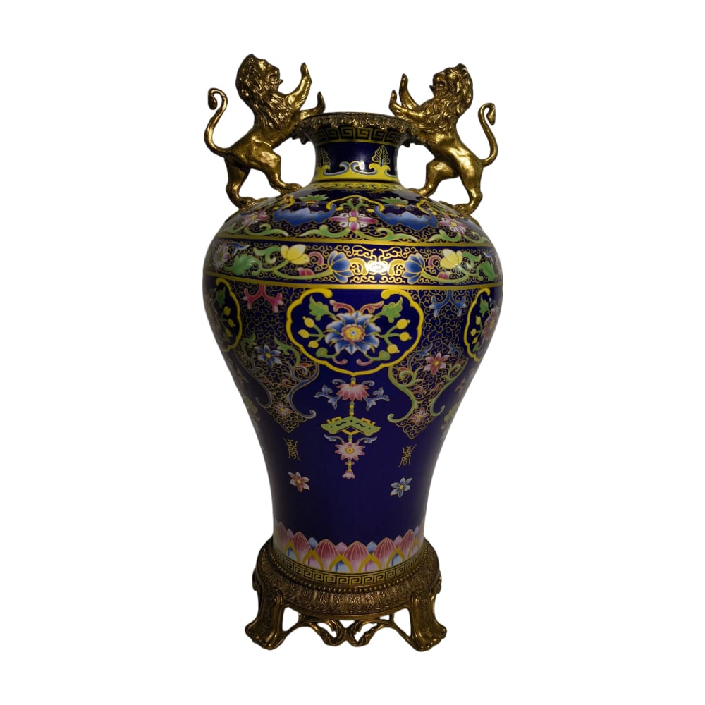 Qing Dynasty Cloisonne Vase with Baoxiang Pattern and Bronze Lion Handles: This vase is a quintessential example of Qing Dynasty cloisonne craftsmanship, adorned with exquisite Baoxiang patterns and vibrant colors. The handles are crafted in the form of bronze lions, adding 