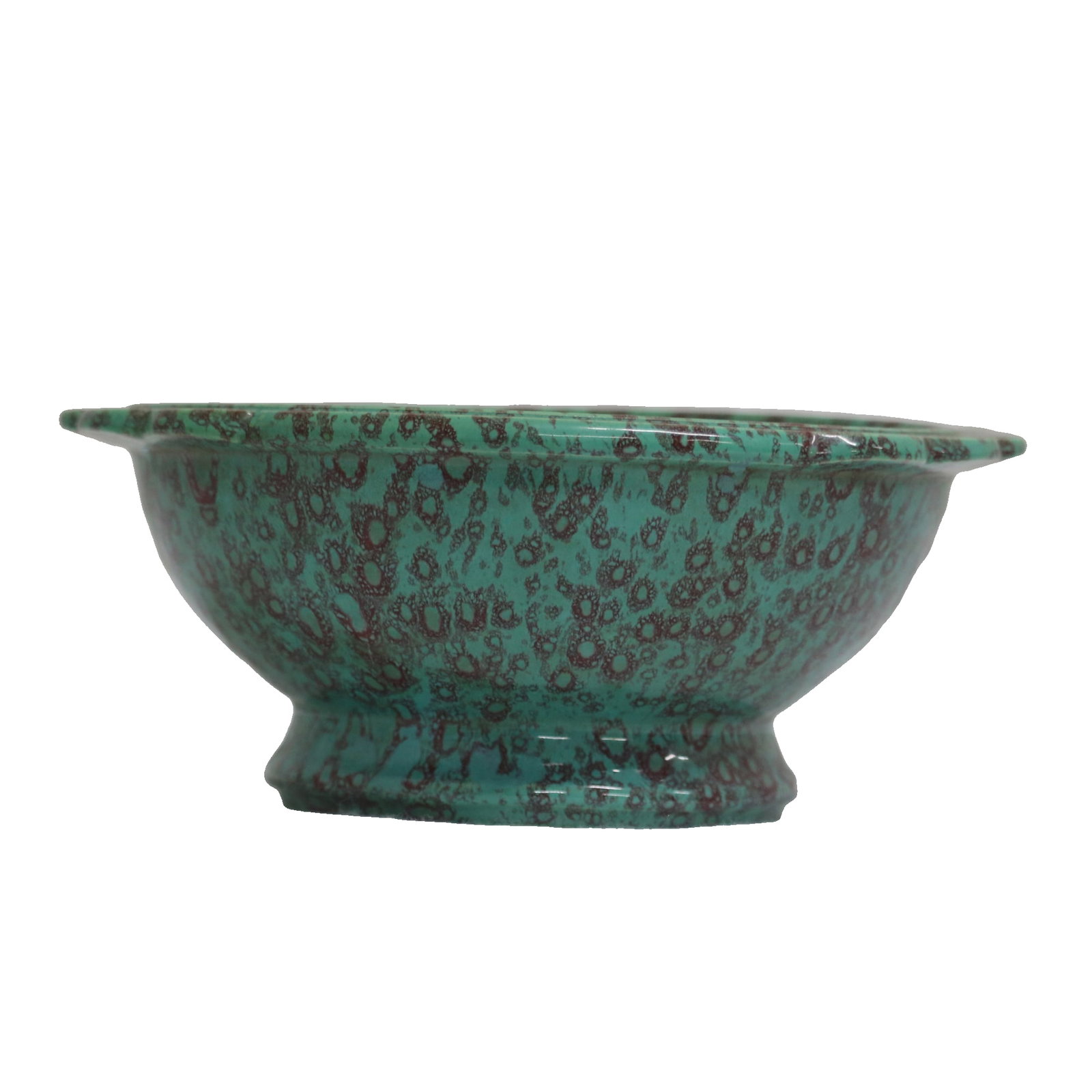 A Qing Dynasty Qianlong Period Jun-glazed bowl with flower-shaped rim and double handles and a high: This Qing Dynasty Qianlong period Jun-glazed bowl with a flower-shaped rim, double handles, and a high foot measures 11cm in diameter, 9cm in height, and weighs 900g. It is a fine example of Qing