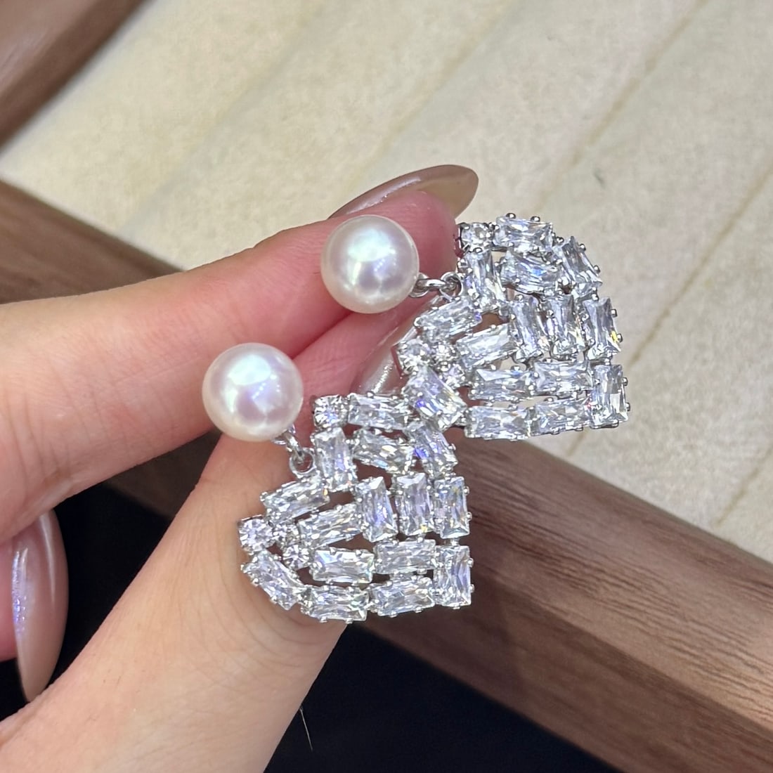 Natural High-Quality Freshwater Pearl Earrings: These earrings feature natural high-quality freshwater pearls, with a diameter of 8-9mm, exuding a captivating luster. The zircon full pave design adds a dazzling brilliance, showcasing a perfect