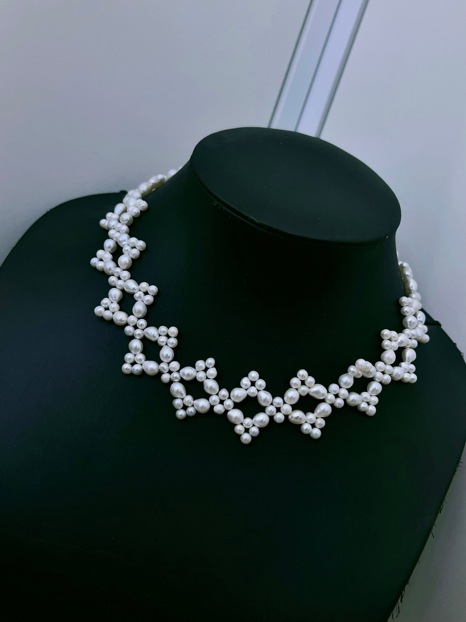 Natural Pearl Necklace: This natural pearl necklace features a multi-layer woven design with an elegant wave pattern, classic and versatile. Each pearl is carefully selected and hand-woven, exuding a noble aura. The pearls