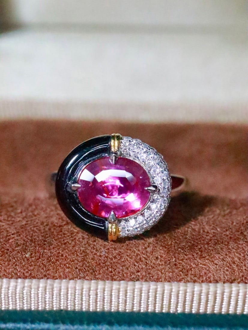 18K Gold Natural Unheated Ruby and Black Onyx Ring: This ring features a vintage elegant Artdeco style, showcasing the perfect combination of black onyx and unheated ruby. Its design breaks convention, giving the wearer a chic urban modern aura. The ba